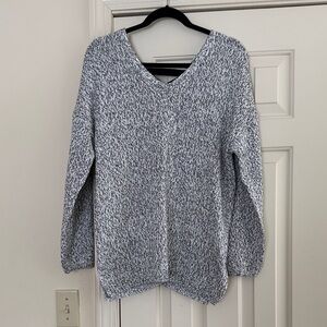 Elegant V-Neck Sweater in Black and White